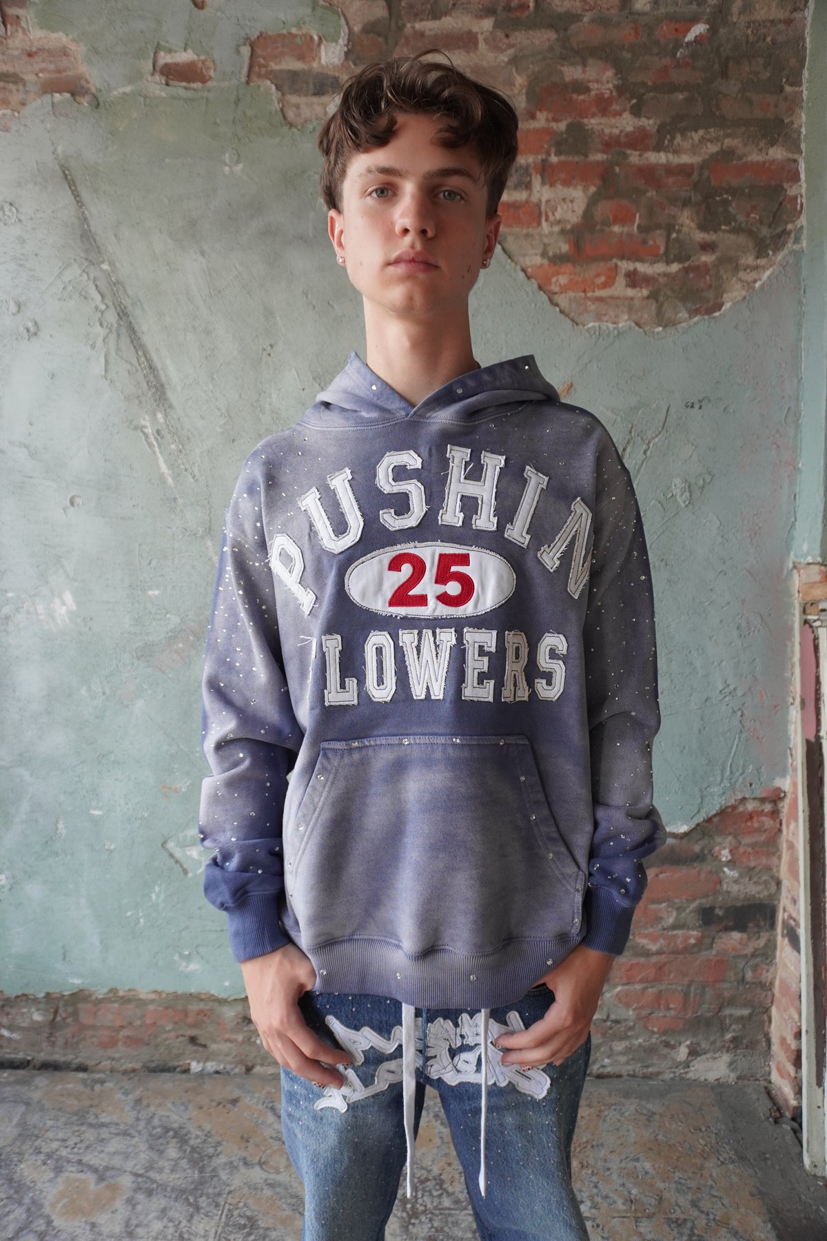 Pushin Flowers rhinestone patch hoodie – premium streetwear pullover, side view