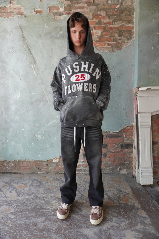 Pushin Flowers rhinestone patch hoodie – premium streetwear pullover, front view