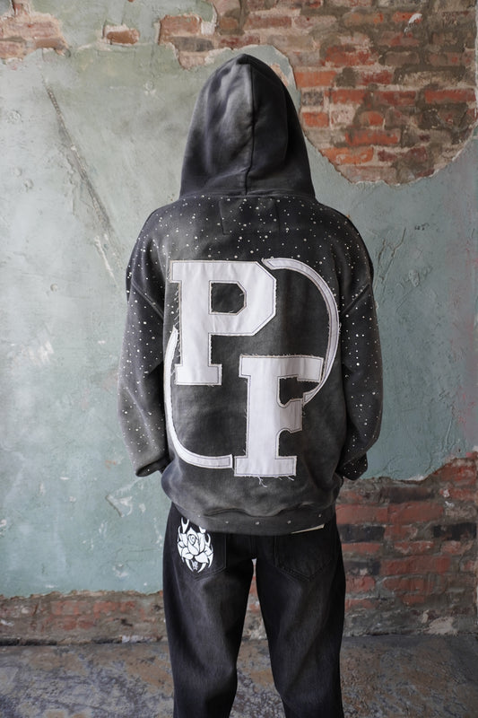 Pushin Flowers rhinestone patch hoodie – premium streetwear pullover, model wearing, full-length
