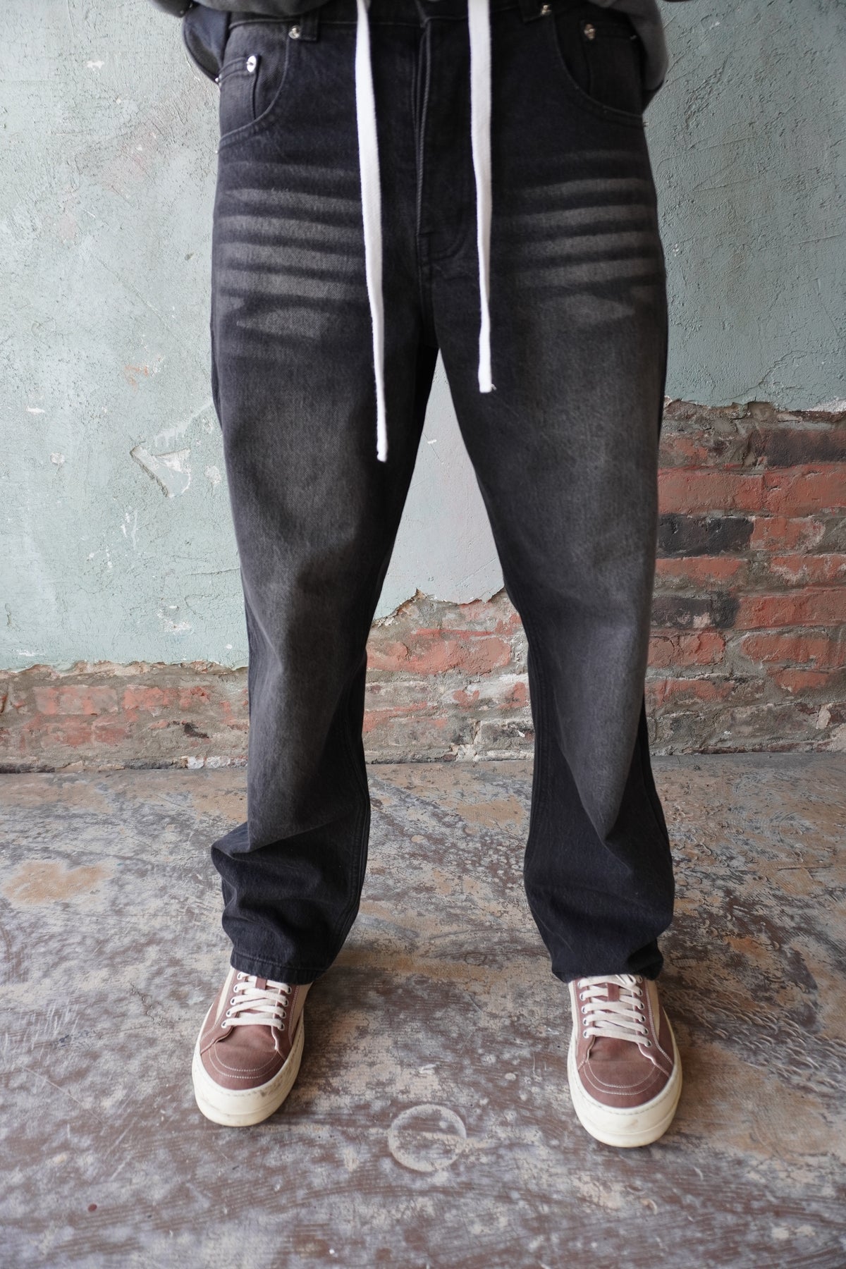 Pushin Flowers baggy denim jeans – PF embroidered streetwear denim, model wearing, full-length
