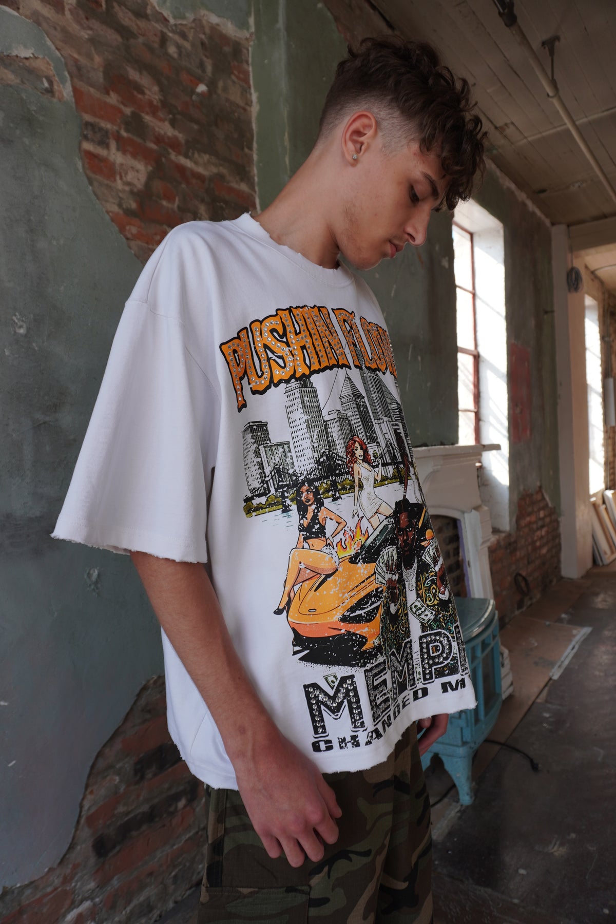 Pushin Flowers Memphis graphic tee – PF City Series streetwear, angled drop-shoulder fit