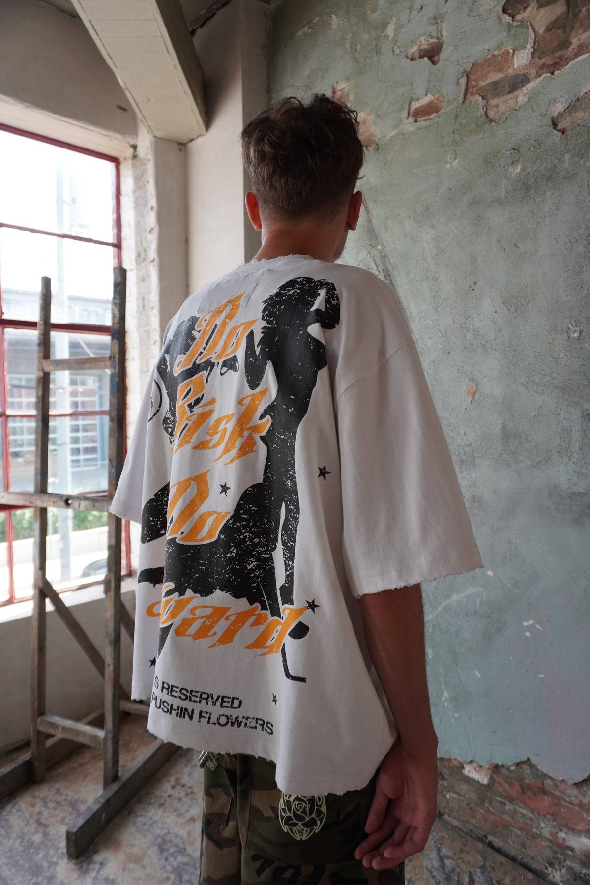 Pushin Flowers Memphis graphic tee – PF City Series streetwear, back graphic detail
