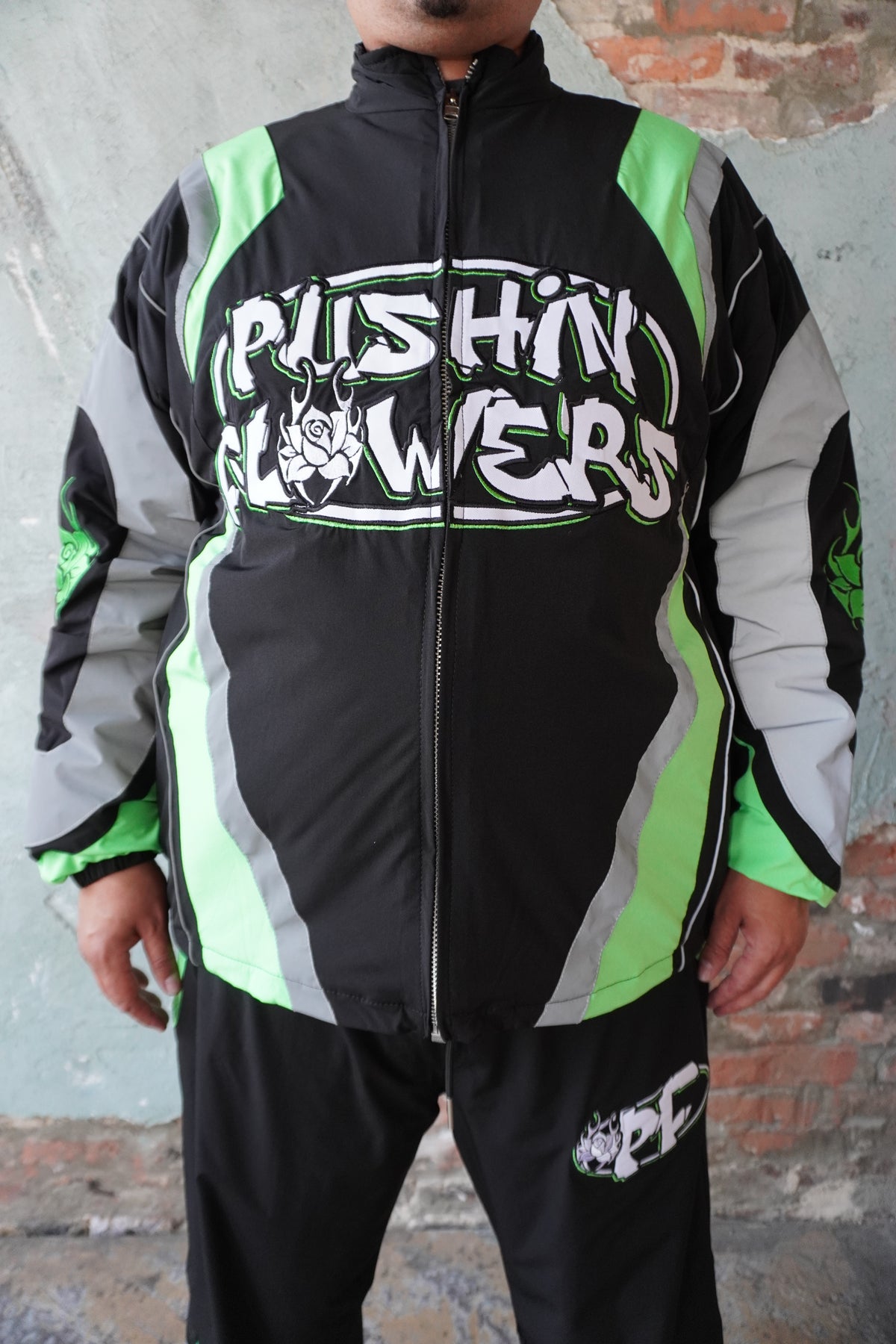 Pushin Flowers two-piece track suit – premium urban streetwear set, model wearing, full-length