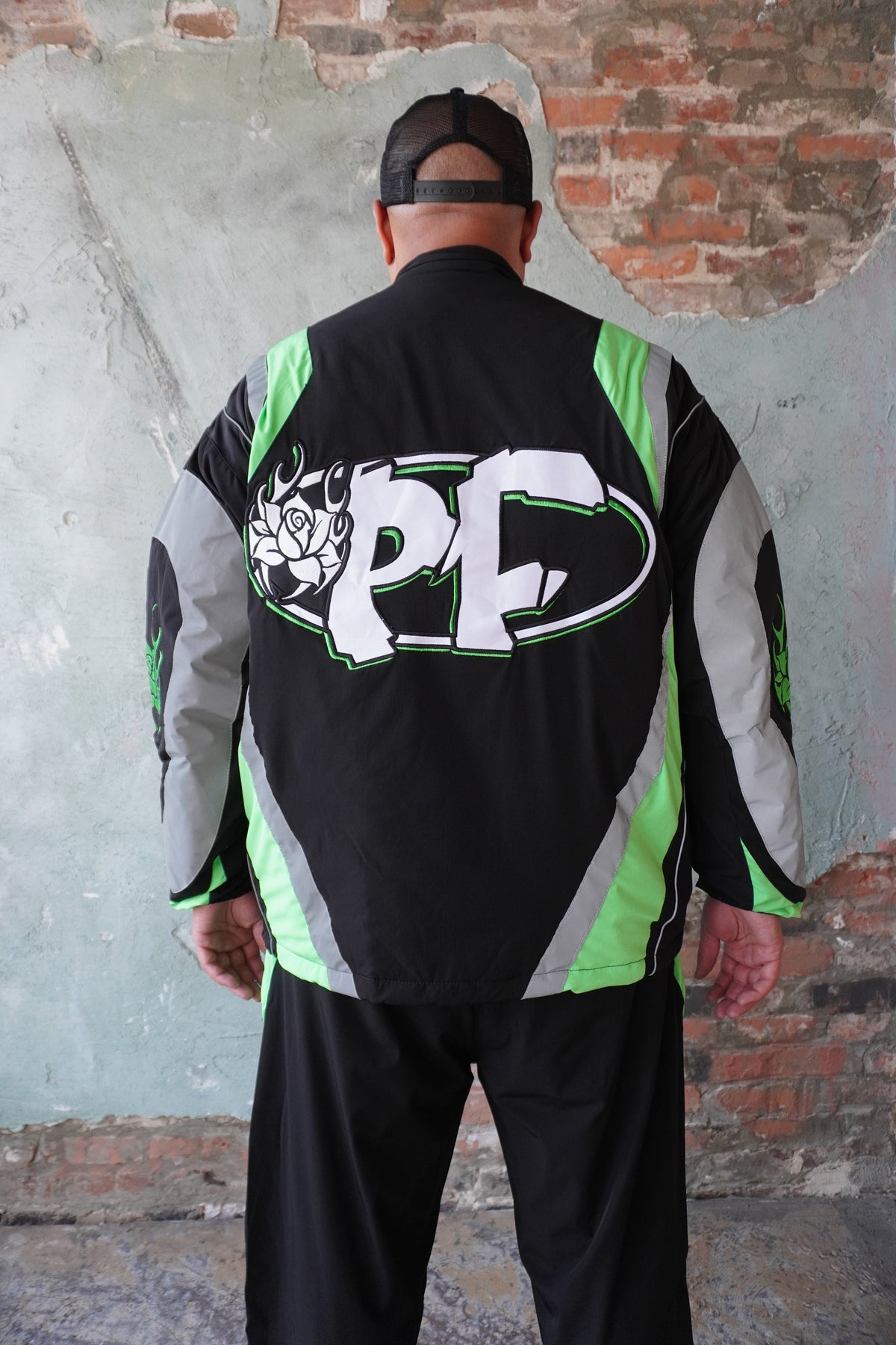 Pushin Flowers two-piece track suit – premium urban streetwear set, angled drop-shoulder fit