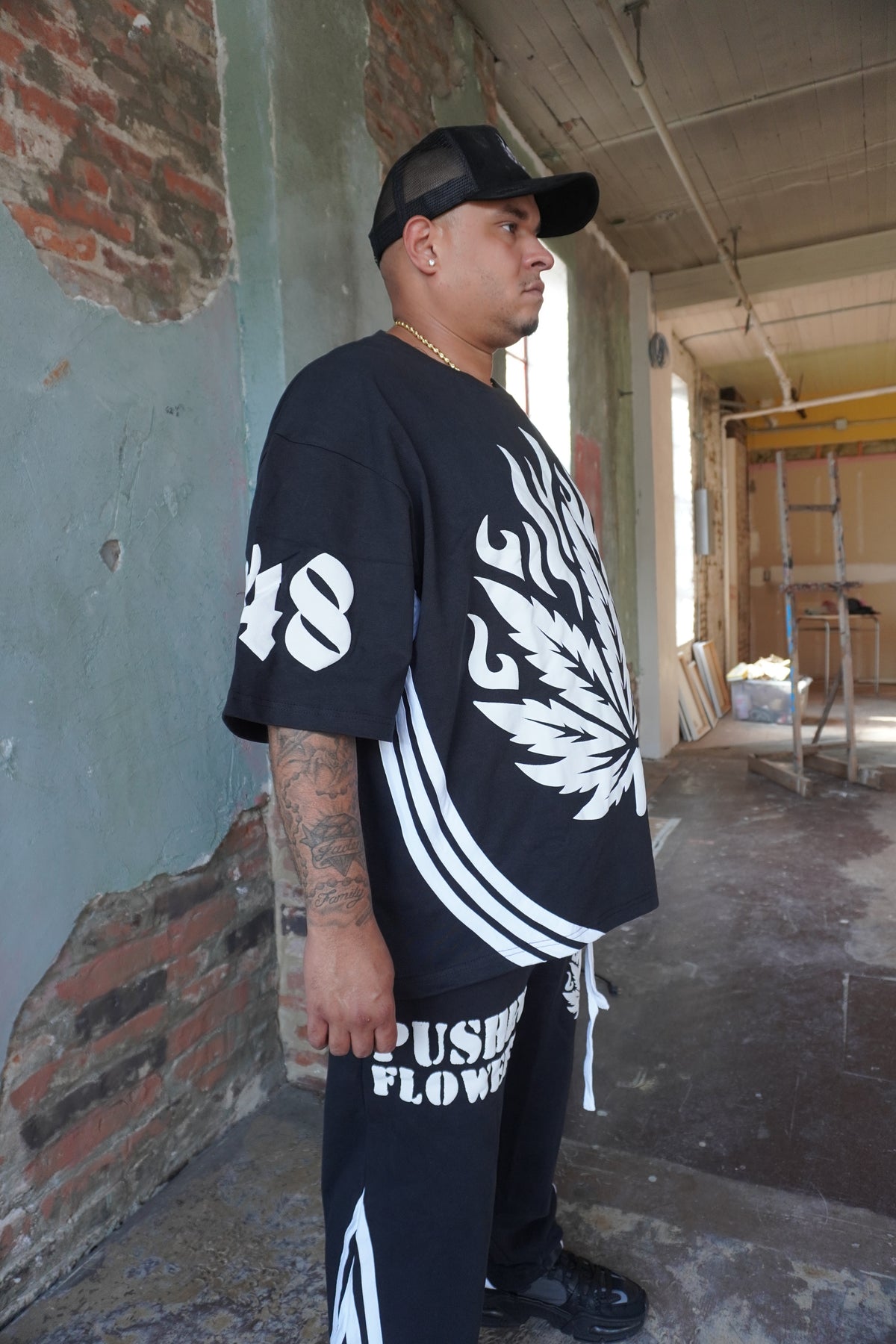 Pushin Flowers striped graphic shirt – PF bold streetwear, front view